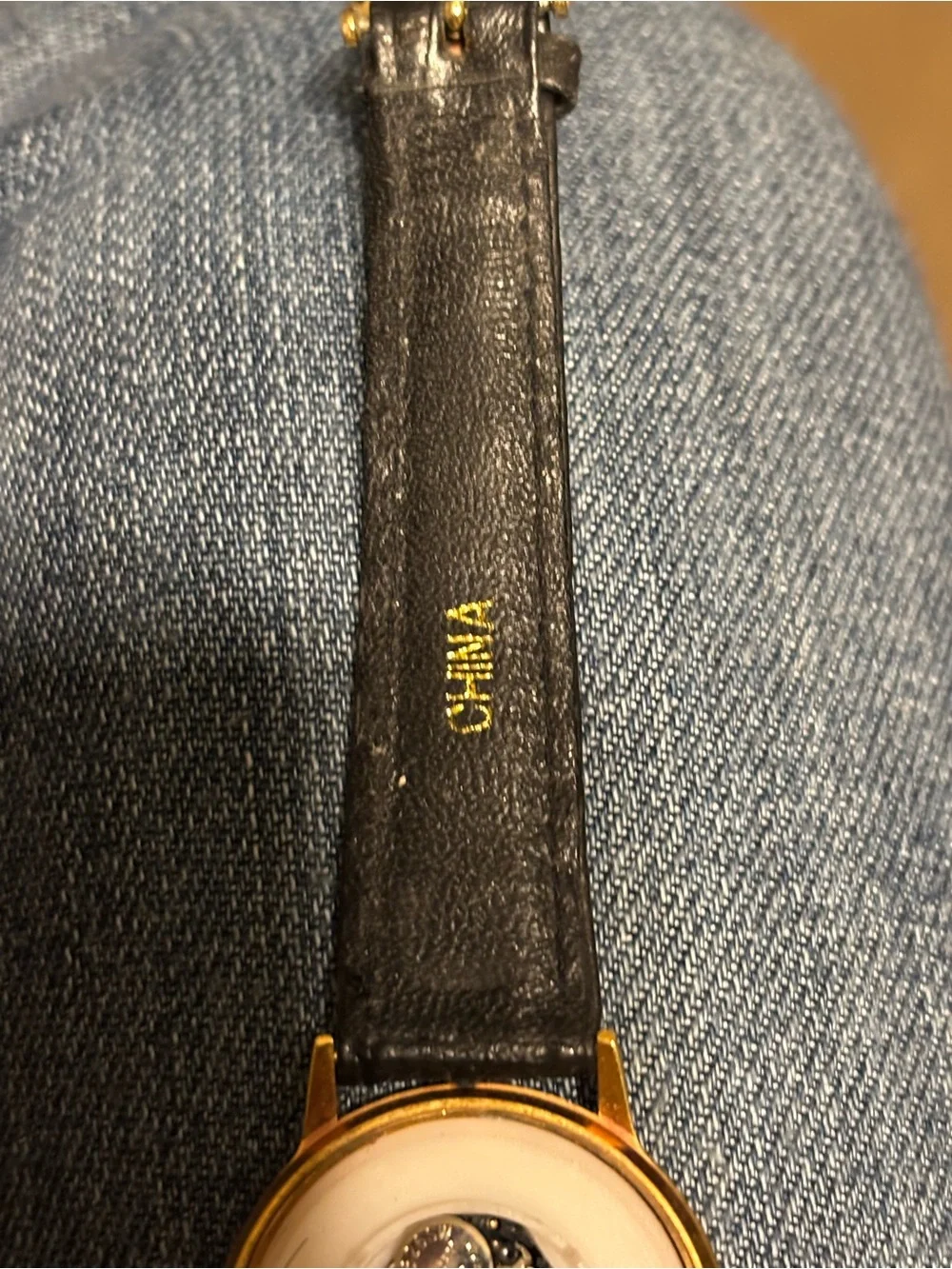 Kodak Gold and Black Kodak Logo Dress Watch